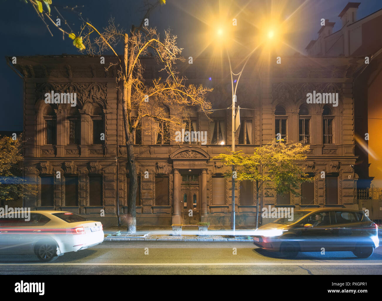 Kyiv, Ukraine, October 1, 2018. Famous Chocolate house. Cars drive on