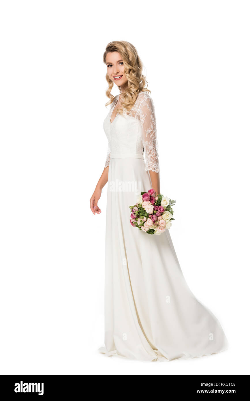 Smiling bride holding bouquet hi-res stock photography and images - Alamy