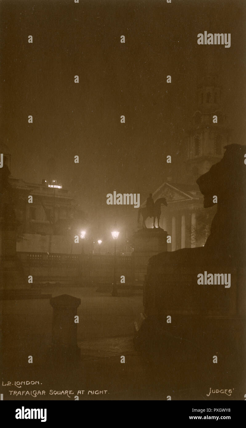 Trafalgar Square, London on a foggy night Stock Photo