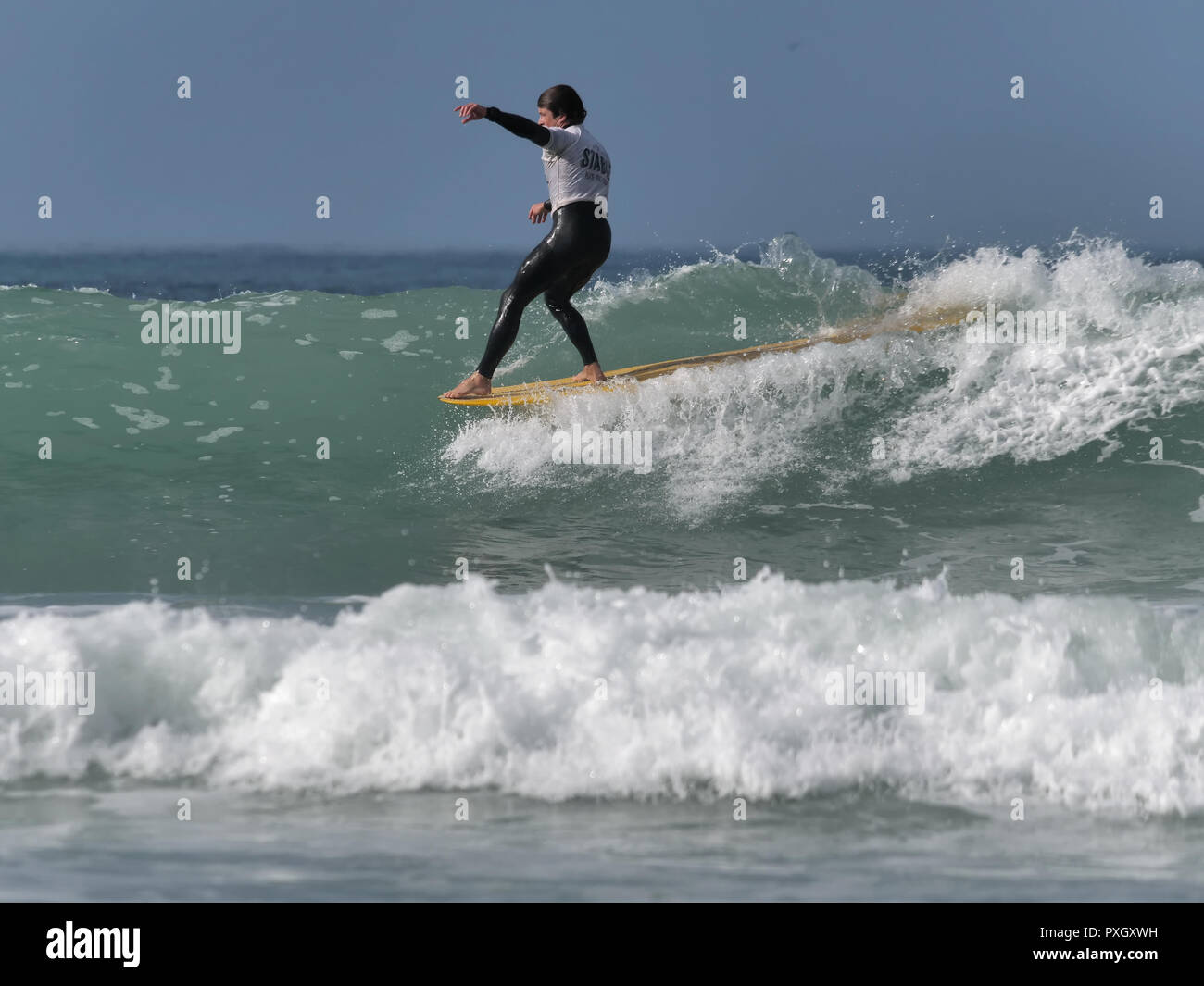 Surfing Longboard Man, UK Stock Photo