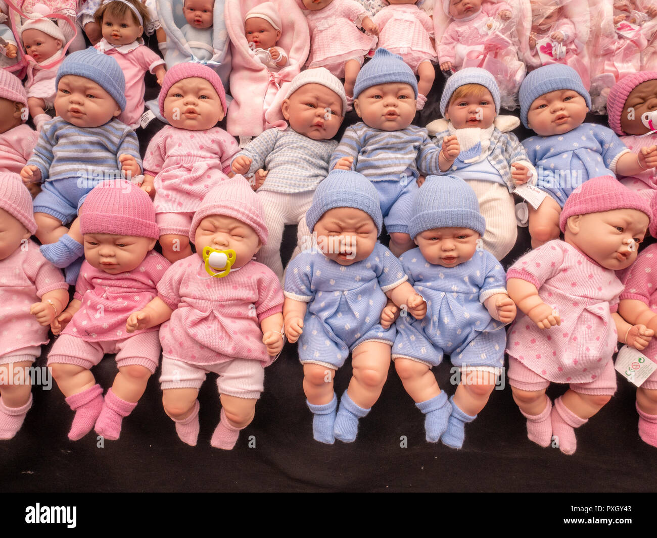 Baby dolls on market stall Stock Photo
