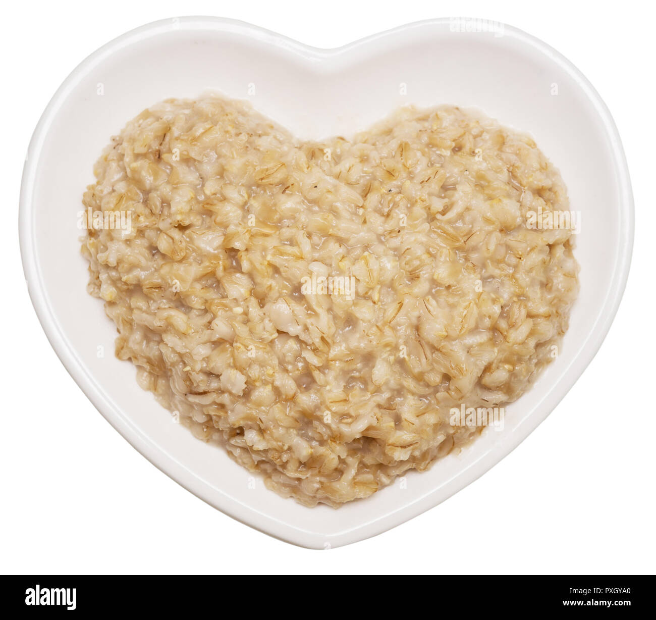 Oatmeal in heart shaped plate isolated on white background Stock Photo ...
