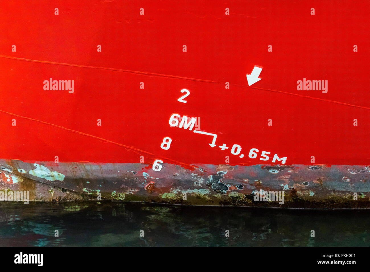 Draft markings on the hull of a cargo ship. in the port of Bergen
