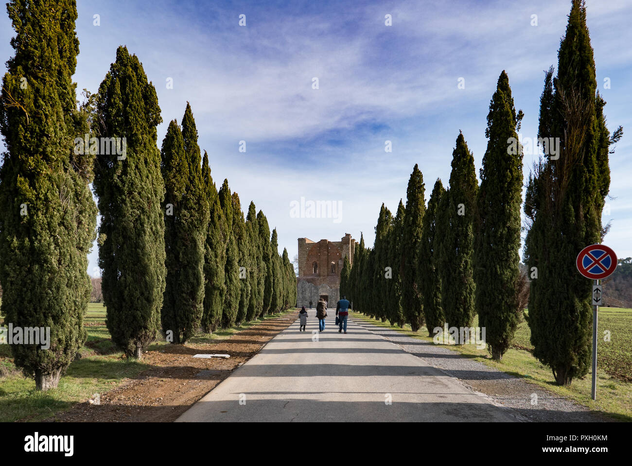Tourists go to see the abbey of San Galgano, italy Stock Photo