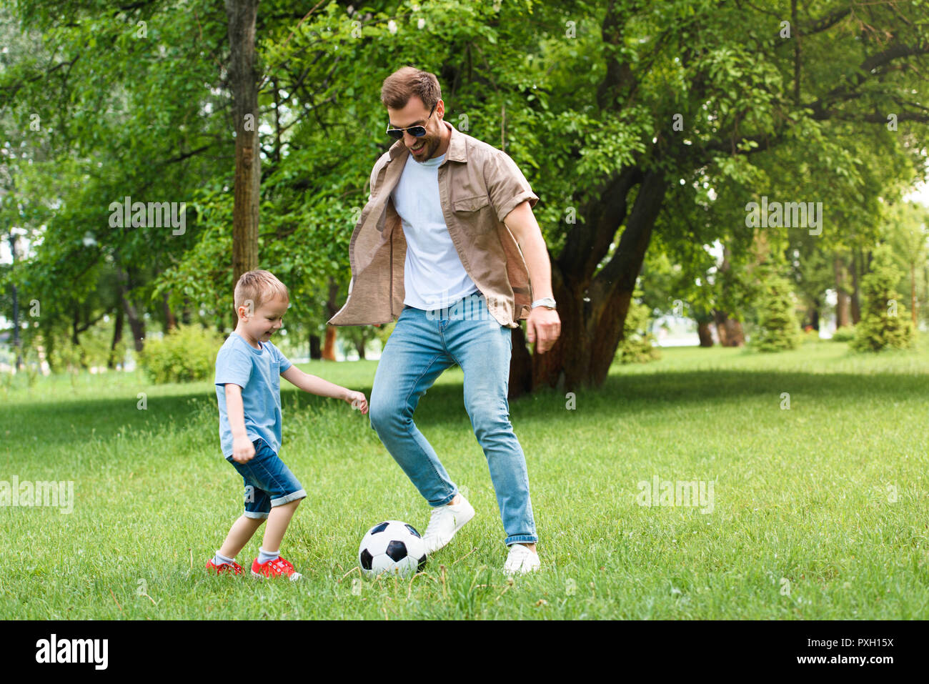 Father son having fun nature hi-res stock photography and images - Alamy