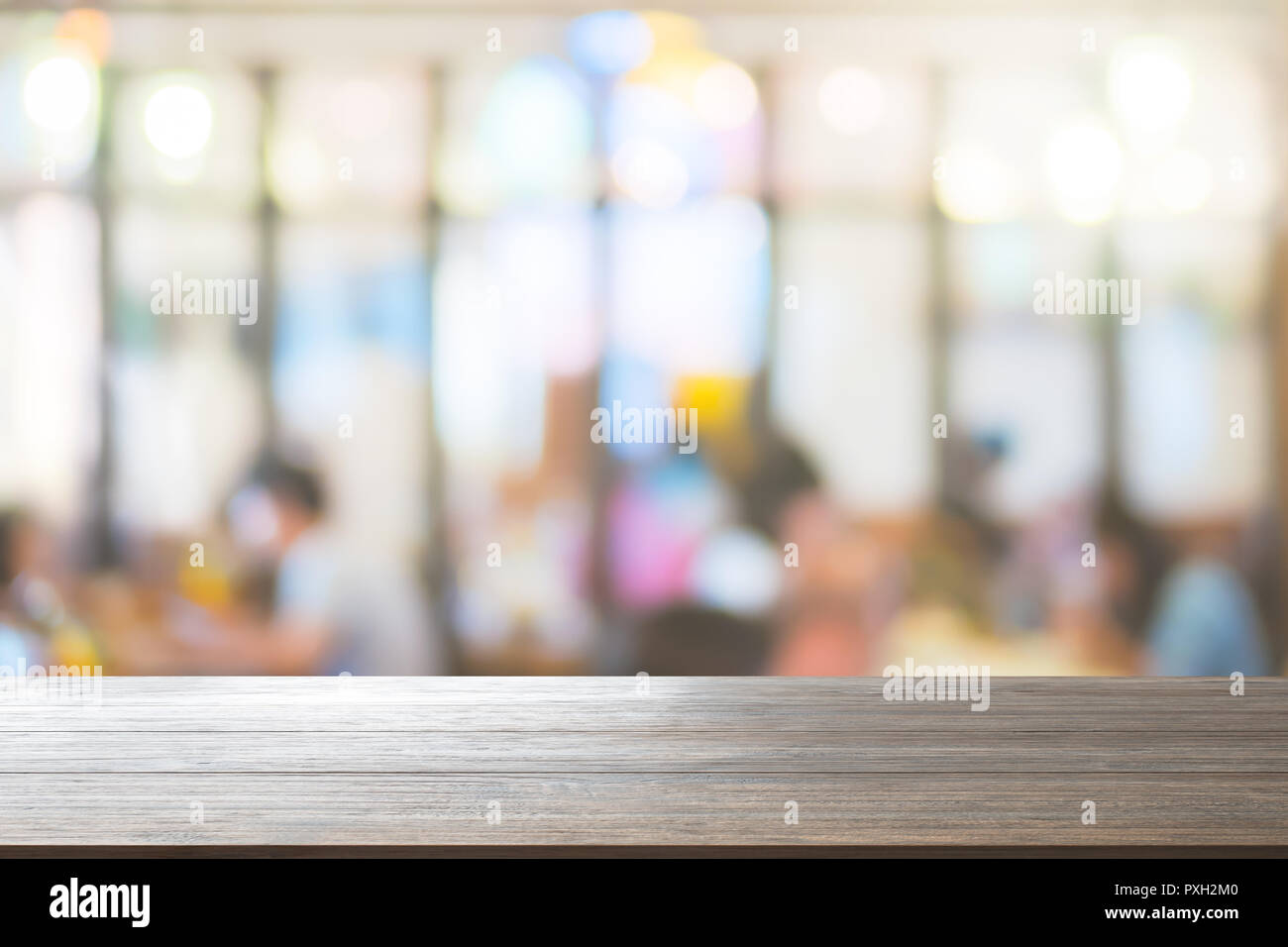 Wood Table Top Background on blurred customer at restaurant or cafe coffee shop blur background use us display or montage your products design Stock Photo