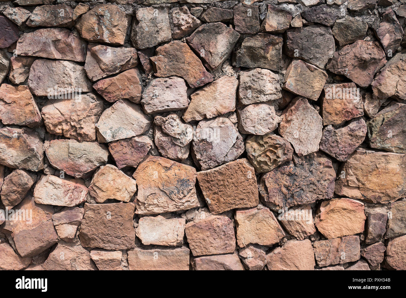 Stone wall texture background ,wall of natural decorative stone Stock Photo