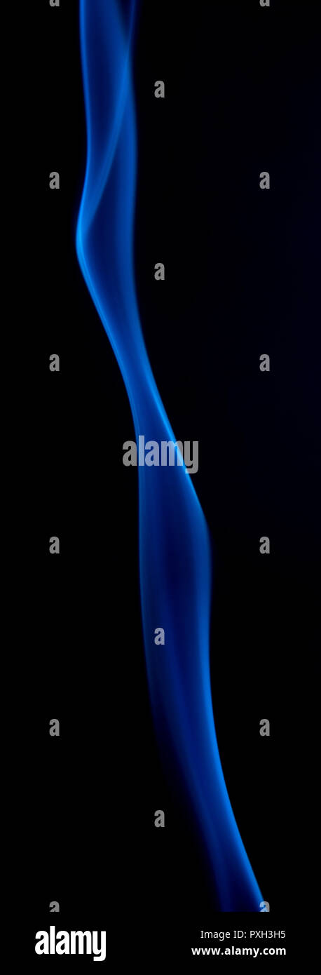 Abstract blue smoke swirls on dark background Stock Photo - Alamy