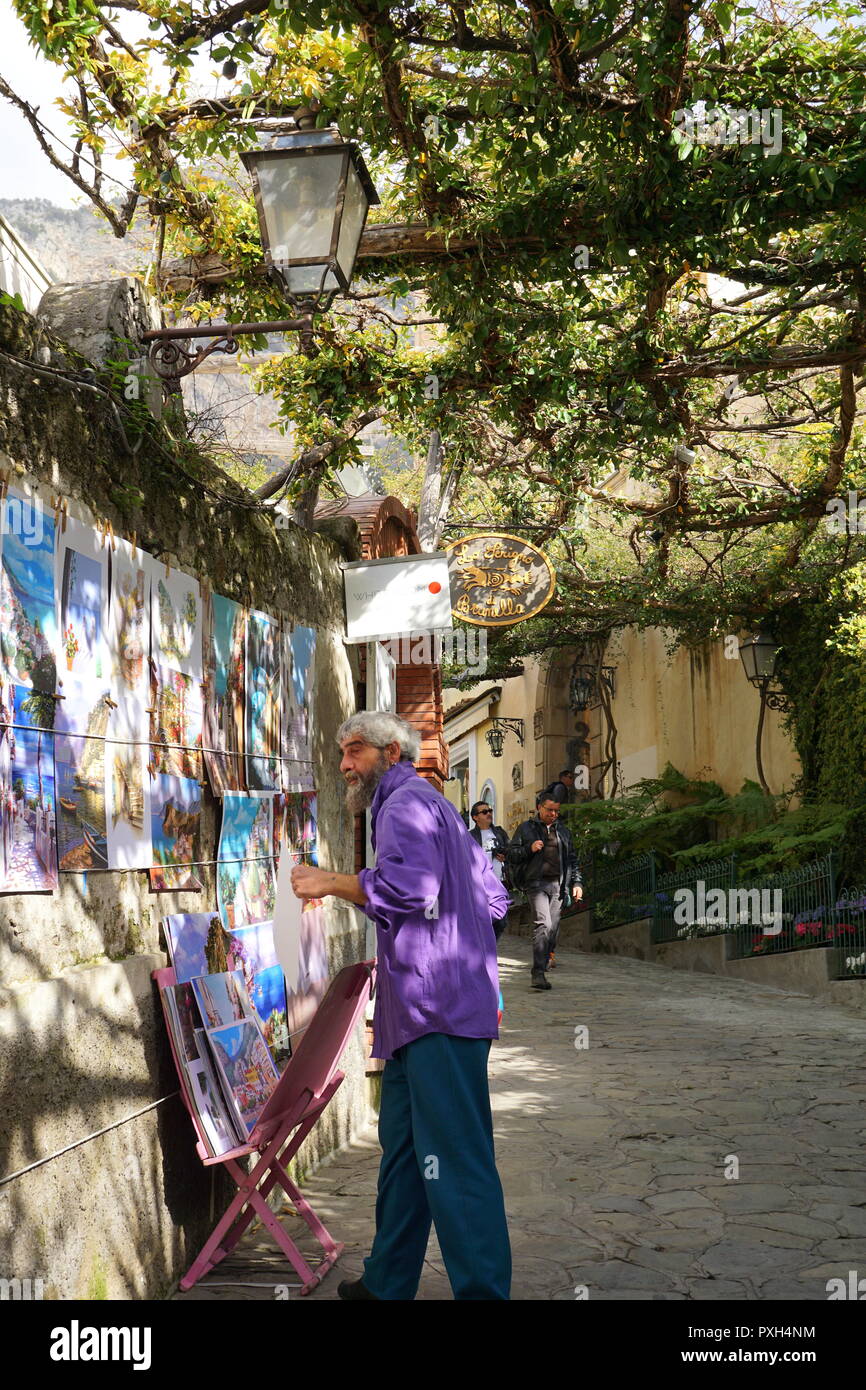 Street artist in Positano, a cliffside village on southern Italy's Amalfi Coast Stock Photo