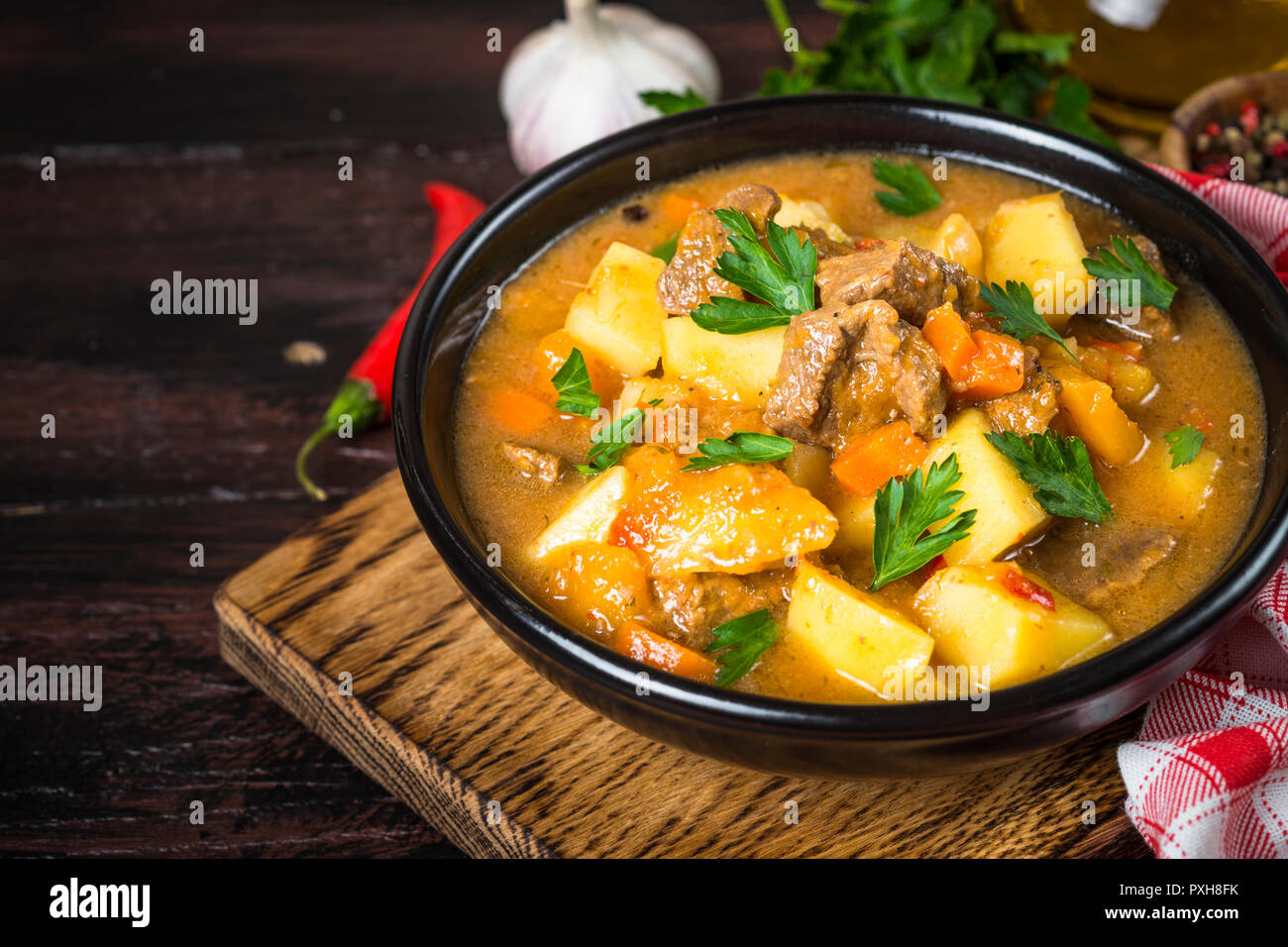 Goulash with meat and vegetables. Beef stew Stock Photo Alamy