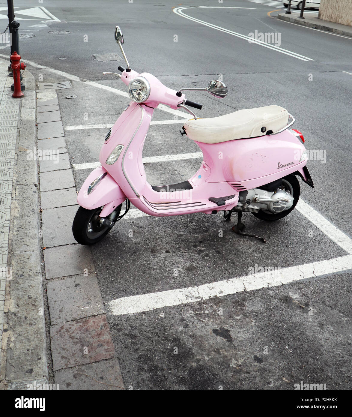 Pink cute Vespa parked on the side way Stock Photo - Alamy