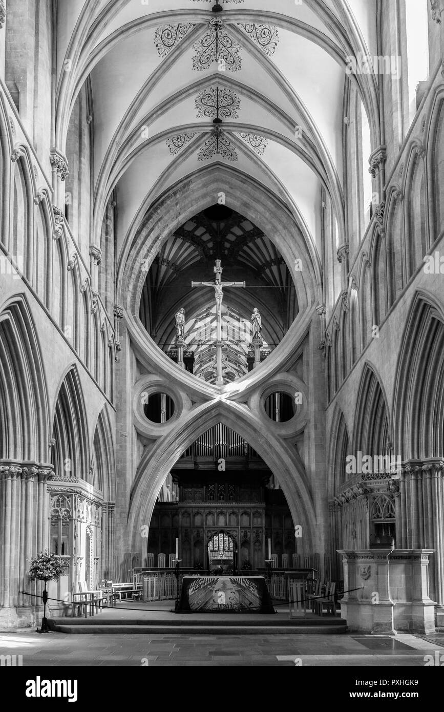 The interior of the medieval 12th century Wells Cathedral facing the scissor arches, Wells, Somerset, UK Stock Photo