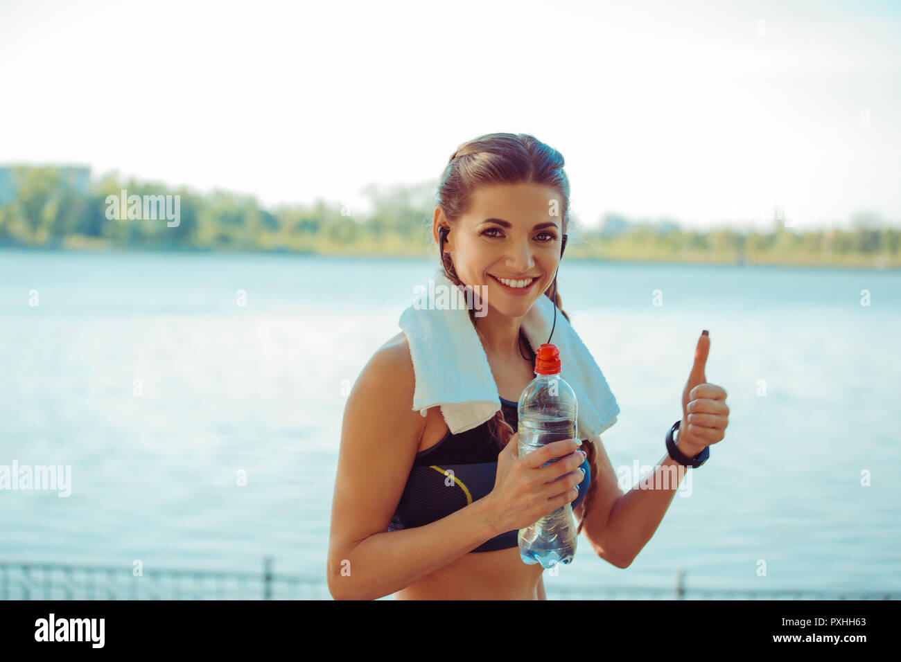 Excited Sportswoman Showing Thumb Up Stock Photo Alamy