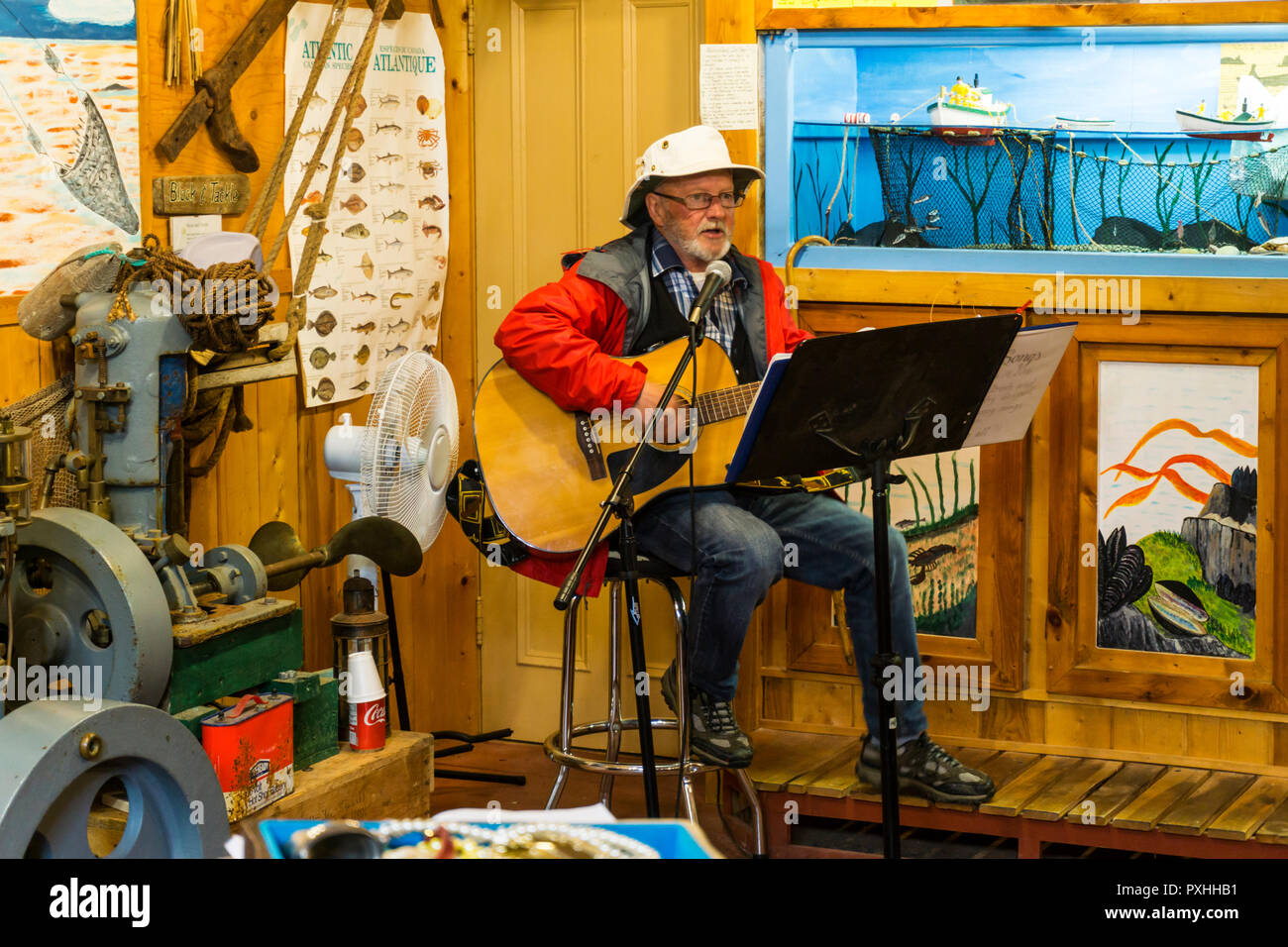 Newfoundland folk music performer at The Prime Berth fishery & heritage centre, near Twillingate, Newfoundland. Stock Photo