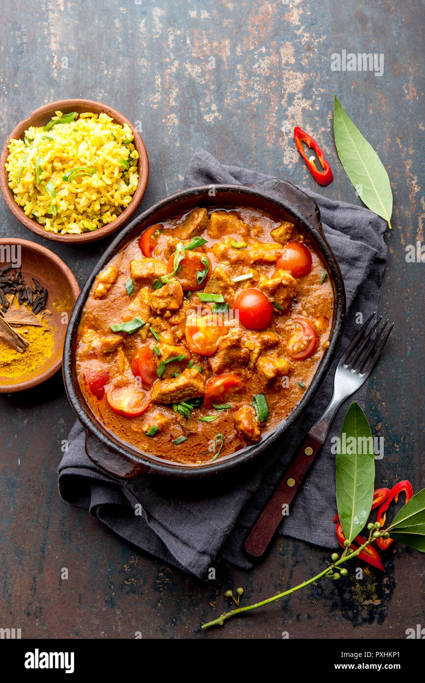 INDIAN FOOD. ROGAN JOSH curry sauce. Pork rogan josh with rice Stock