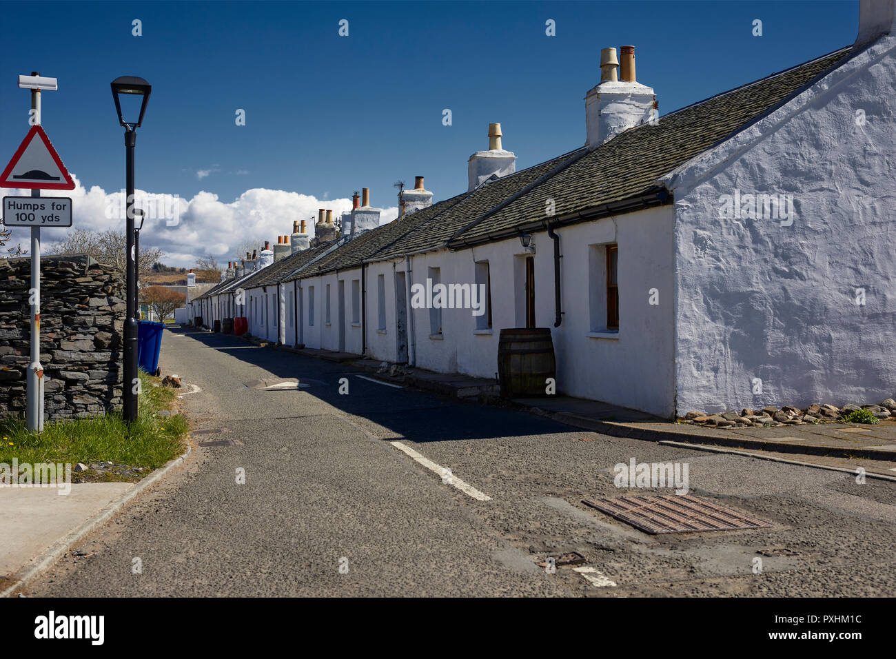 Row of single storey, traditional cottages at Easdale. Oban, Argyll Stock Photo
