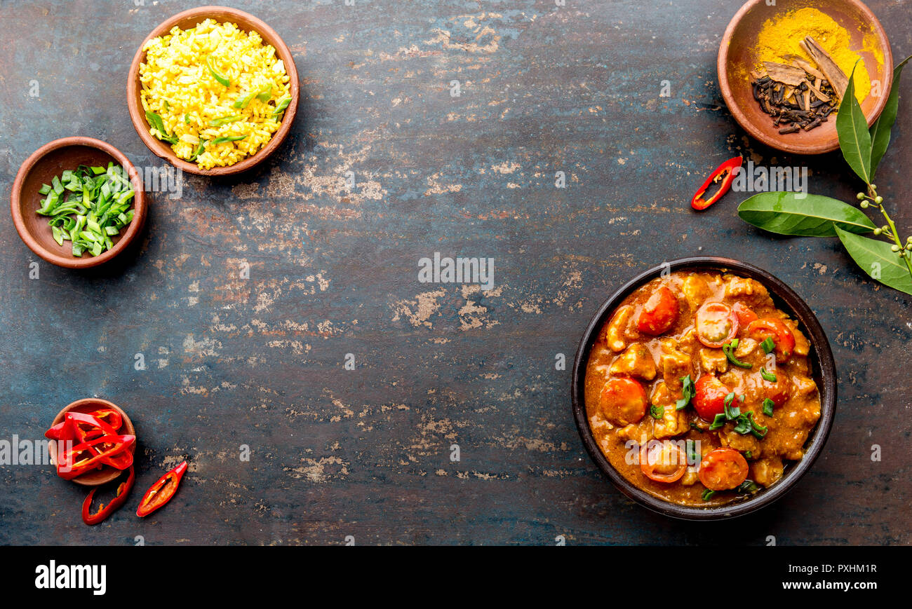 INDIAN FOOD. ROGAN JOSH curry sauce. Pork rogan josh with rice Stock