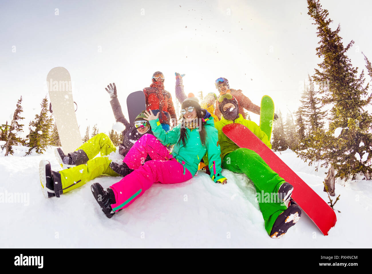 Winter vacations concept with group of happy friends at ski resort Stock Photo