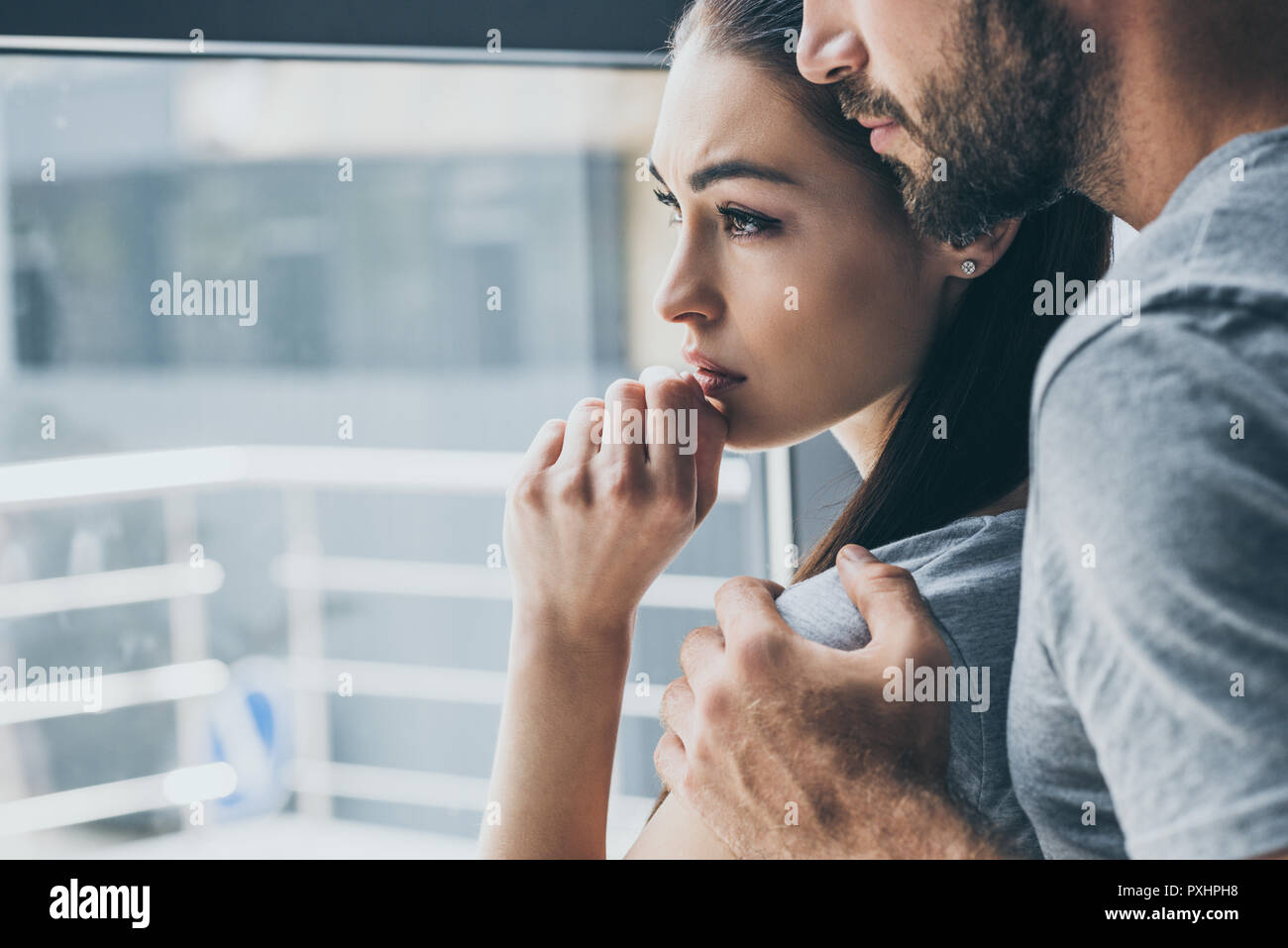 Woman Sad Man Window High Resolution Stock Photography and Images - Alamy