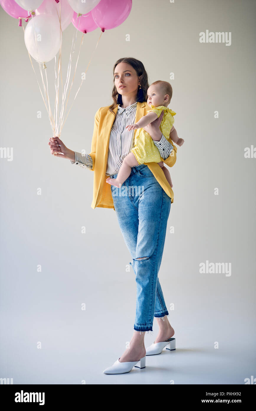 Carrying baby cheap girl low