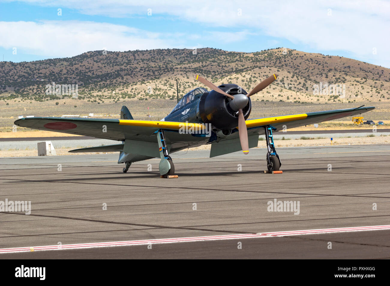Japanese A6M3 Model 22 Zero fighter sits on the ramp at Reno Stead Airport near Reno, Nevada. Stock Photo