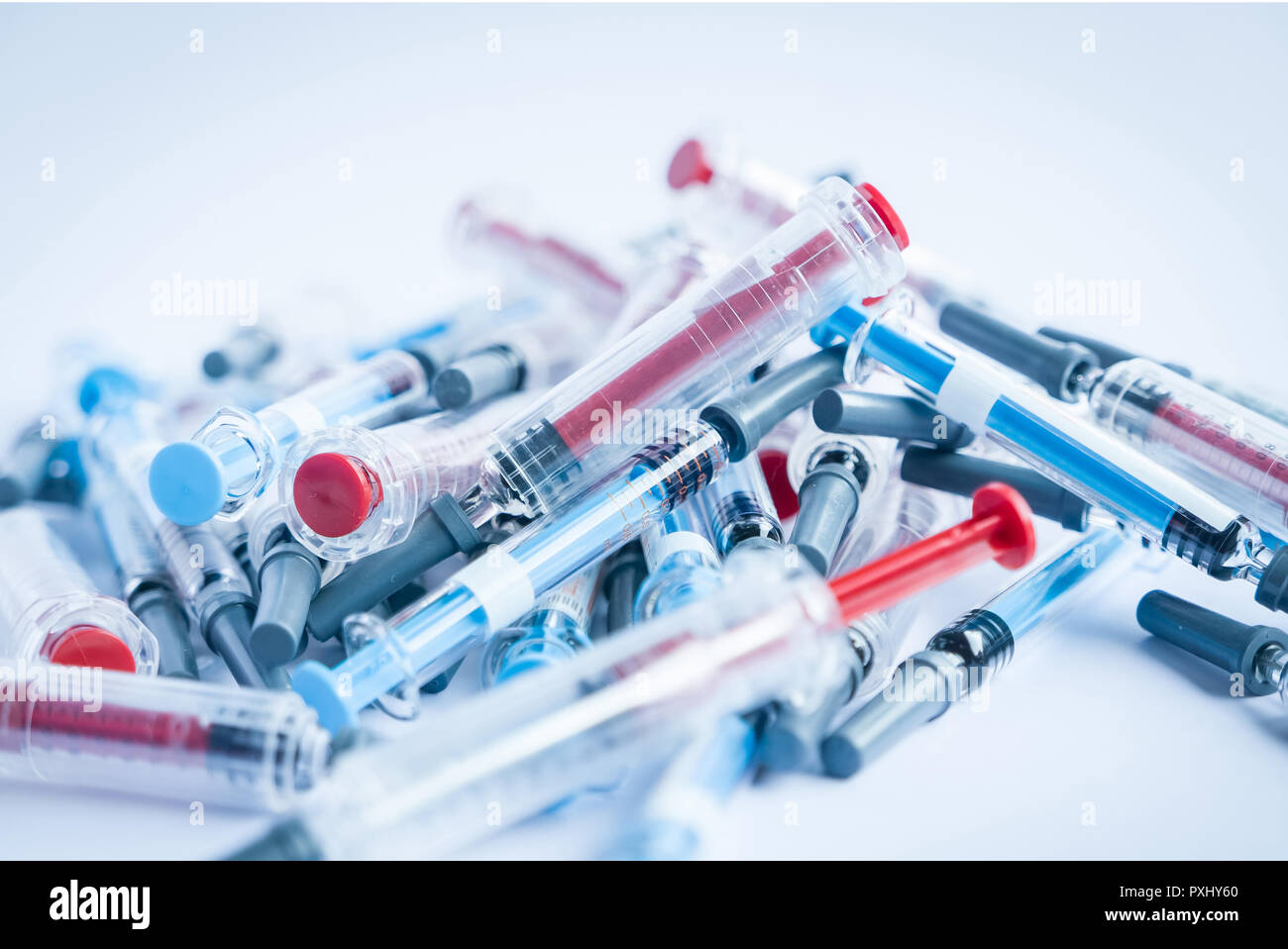 Pile of used syringes, everyday injections of insulin and heparin Stock