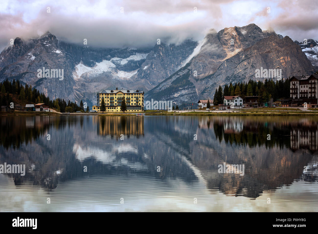 View of Punta Sorapis mountain of the Dolomites in the morning with the reflection on the famous lake Misurina at Cortina d'Ampezzo in Italy Stock Photo