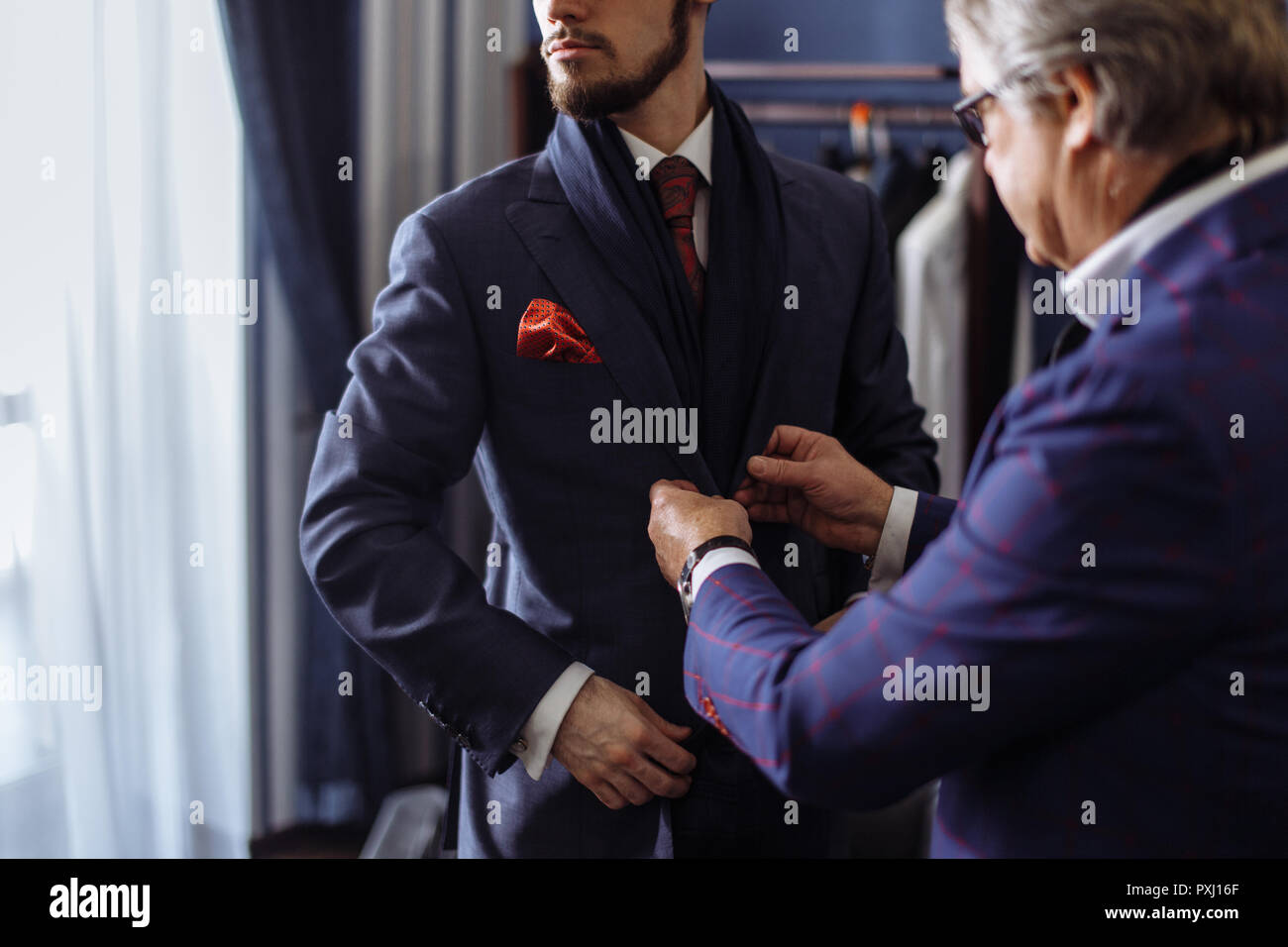 Tailor suit hi-res stock photography and images - Alamy