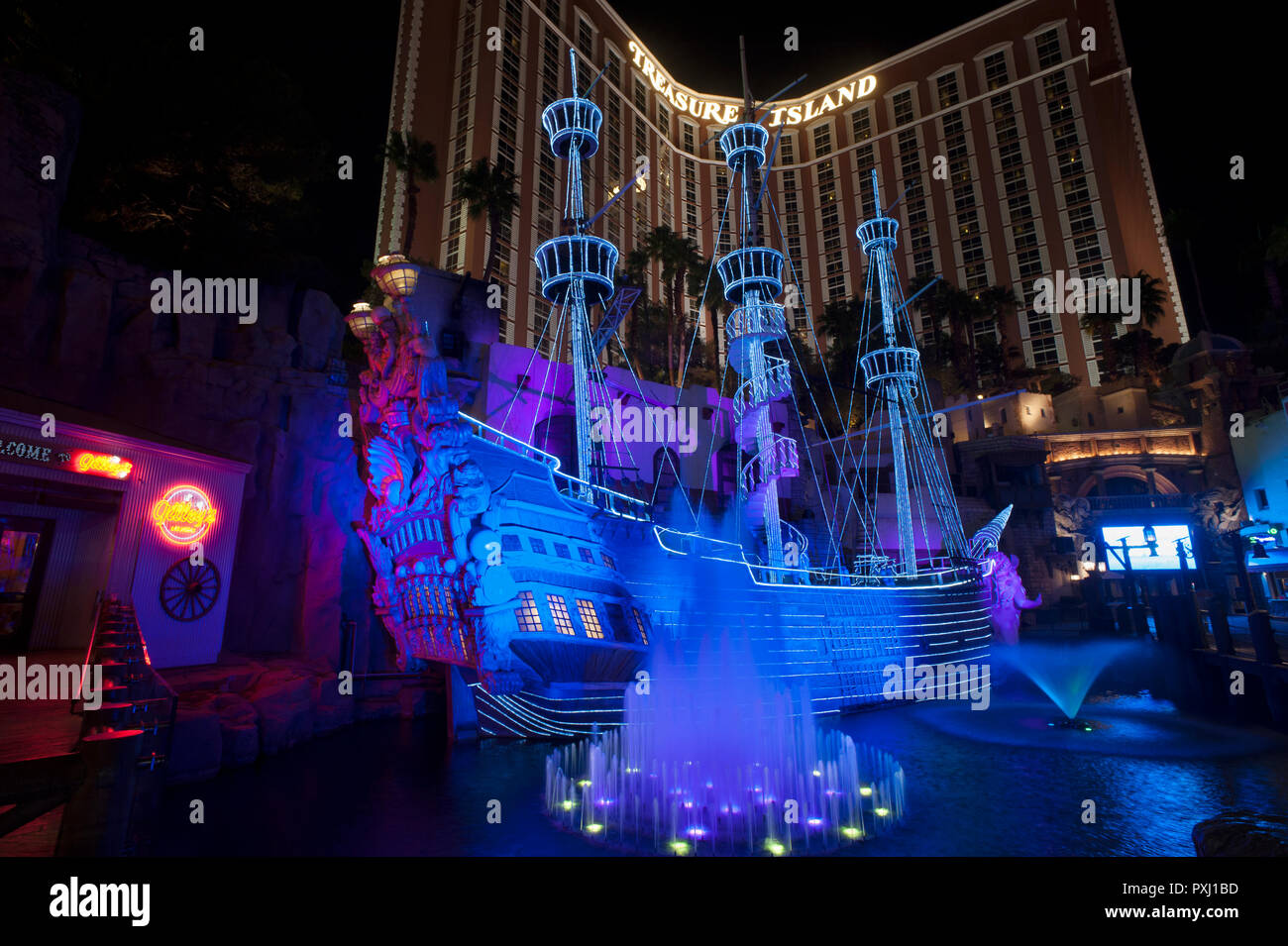 Illuminated pirate ship at Treasure Island Hotel and Casino, Las Vegas, Nevada, USA. Stock Photo
