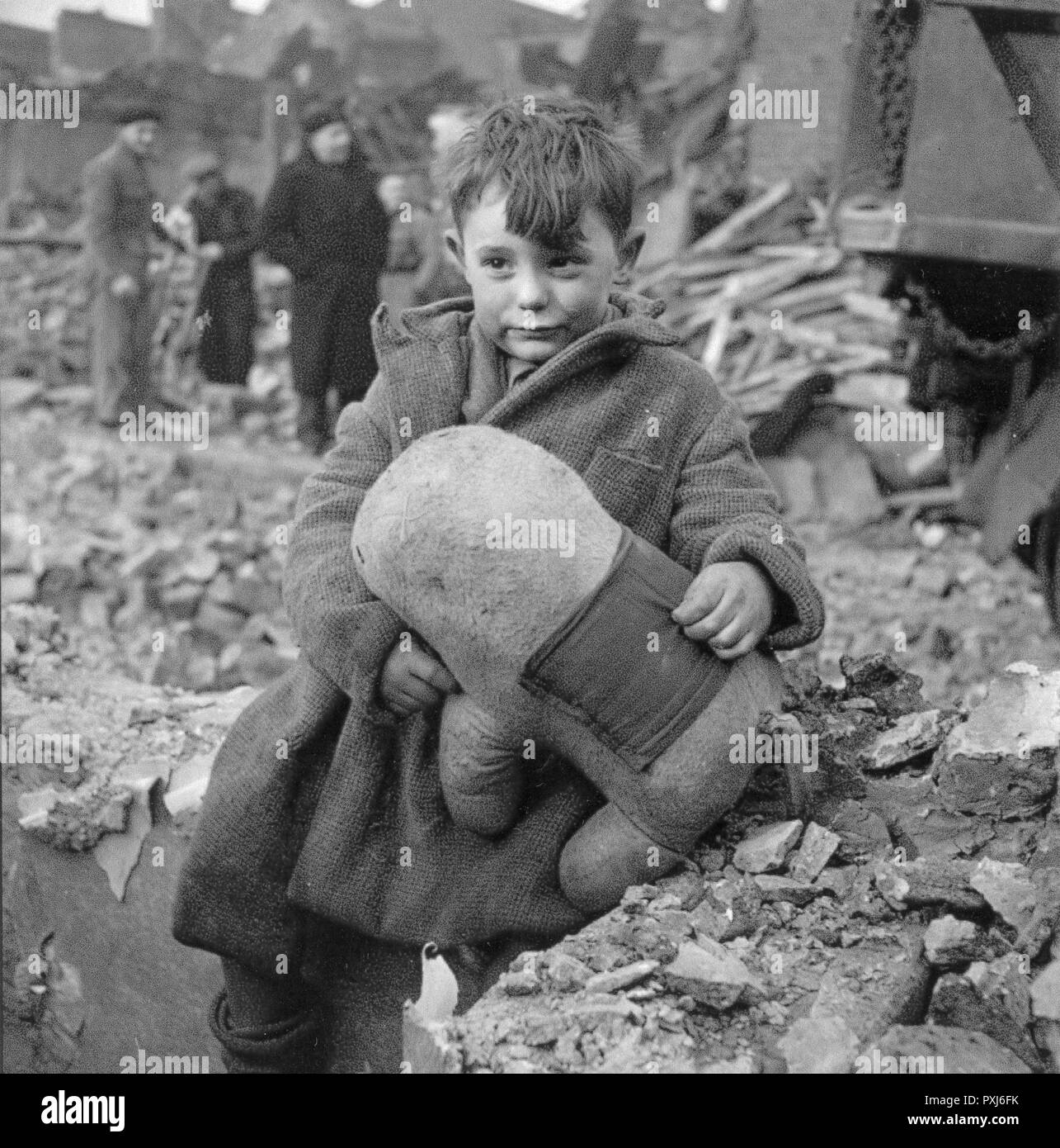 WW2 - Home Front - Young Blitz victim with his cuddly Toy, salvaged ...