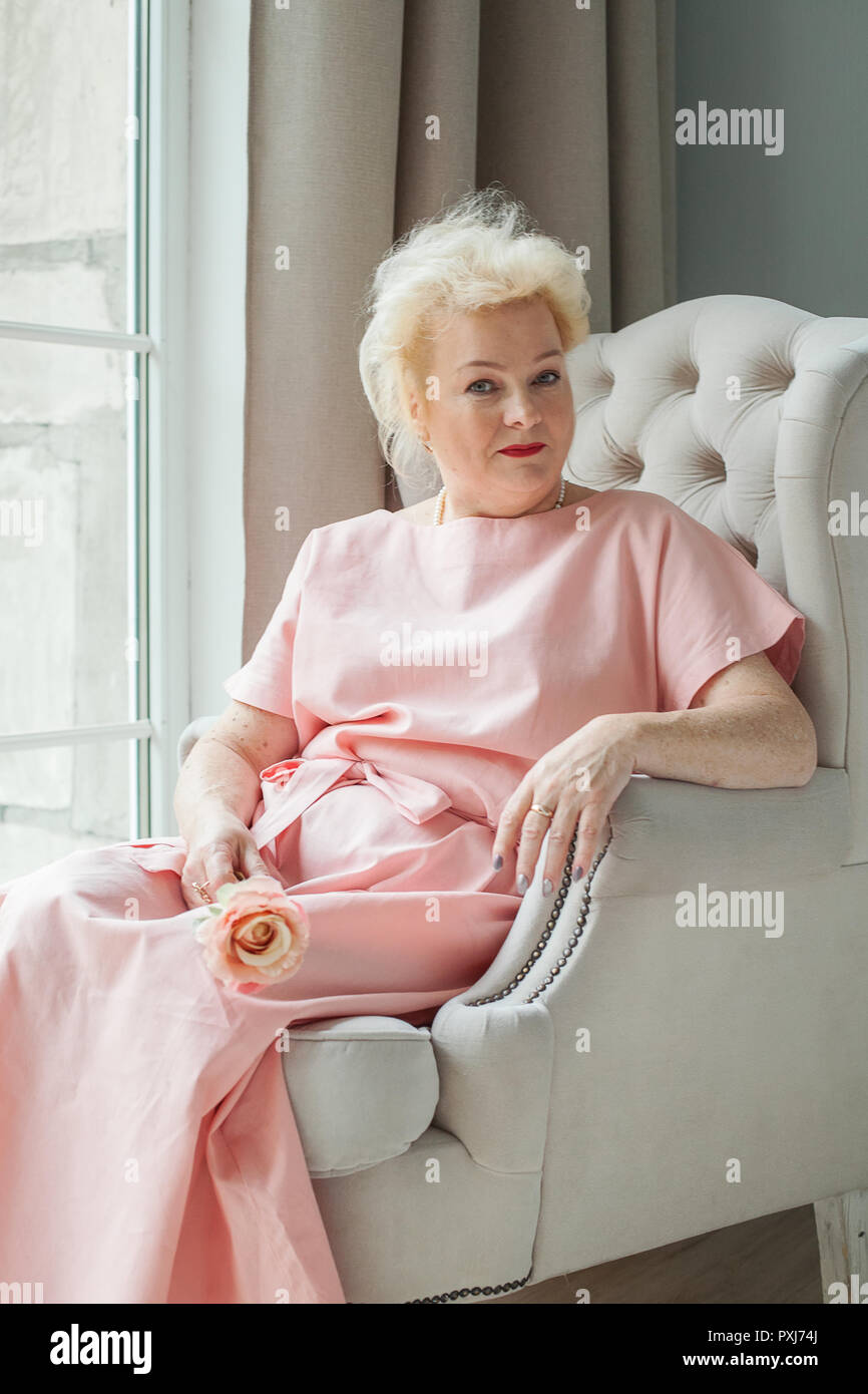 Old Lady In Pink A Beautiful Old Woman Dressed In A Pink Dress With A Pink Old Lady In Pink A Beautiful Old Woman Dressed In A Pink Dress With A Pink