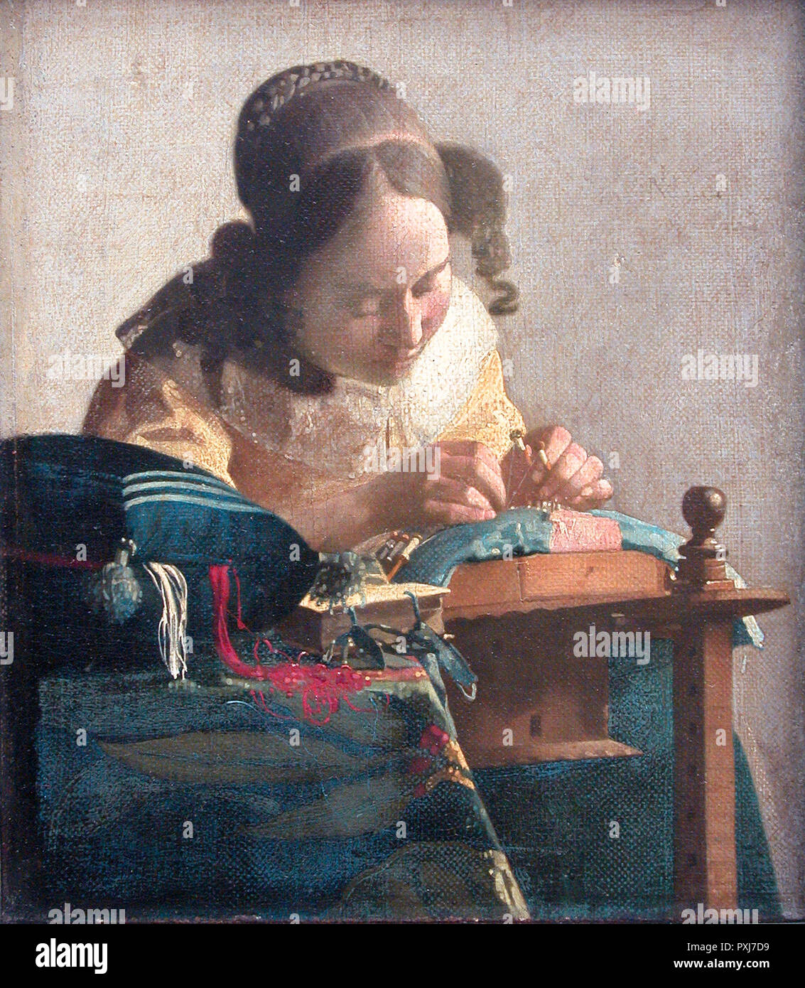 The lacemaker by Johannes Vermeer (c.1669-1671) Stock Photo