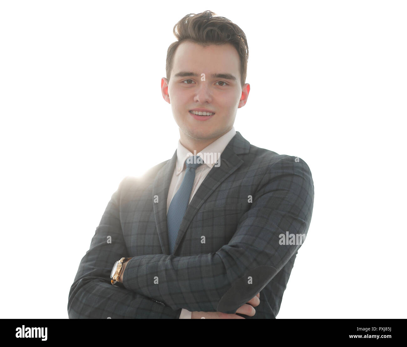 successful businessman standing with arms crossed in front of him Stock ...