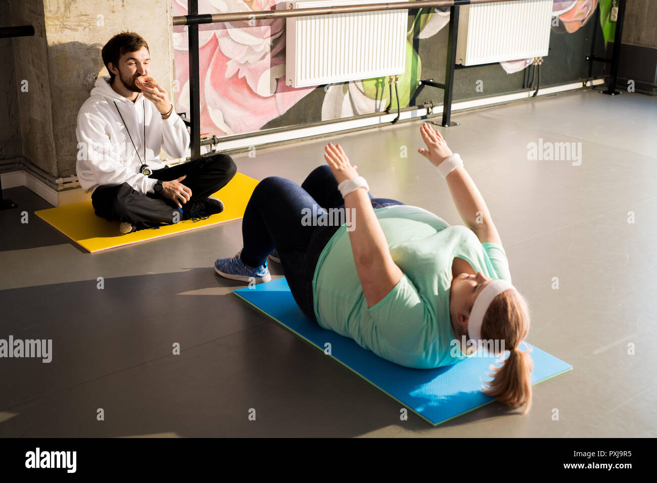 Obese Woman Working Out Stock Photo