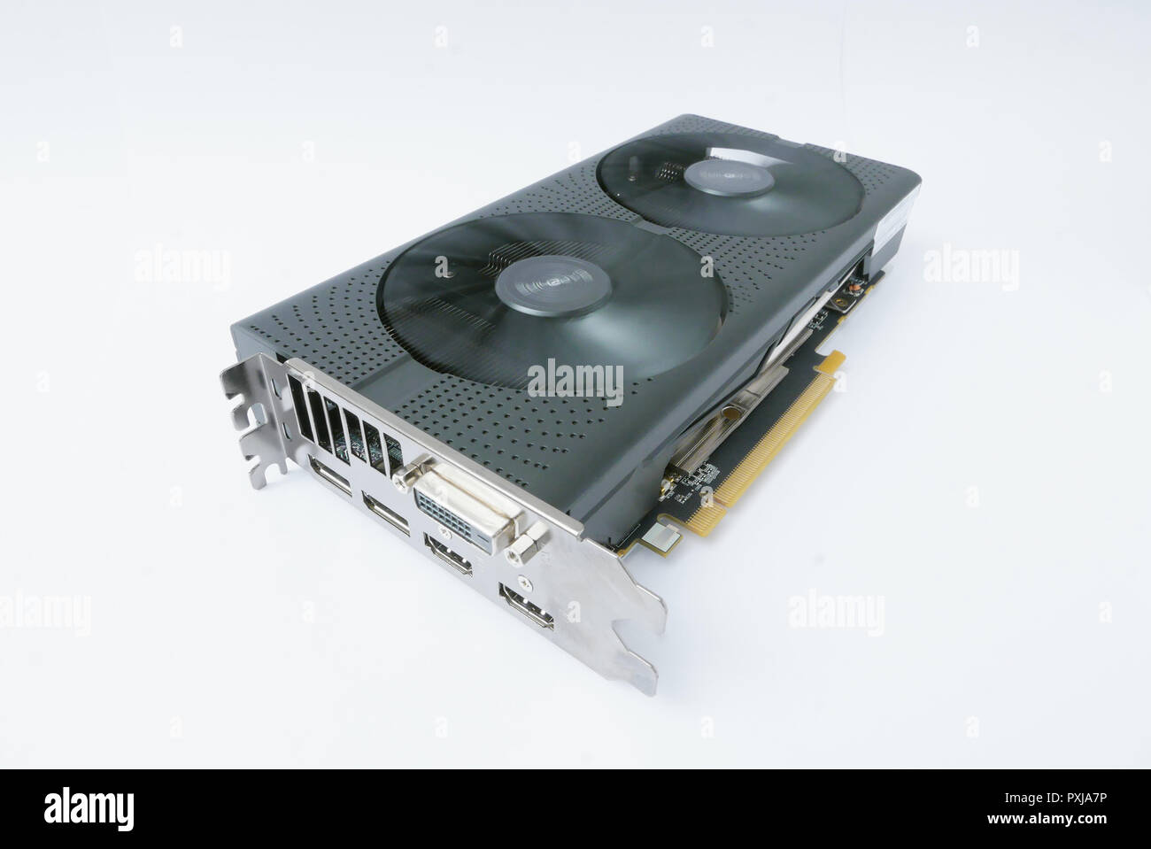 Powerful graphics card with spinning fan coolers isolated on white