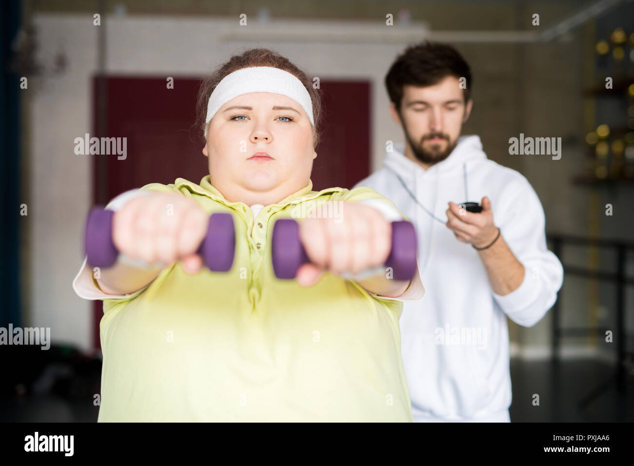 Motivated Fat Woman Training Stock Photo