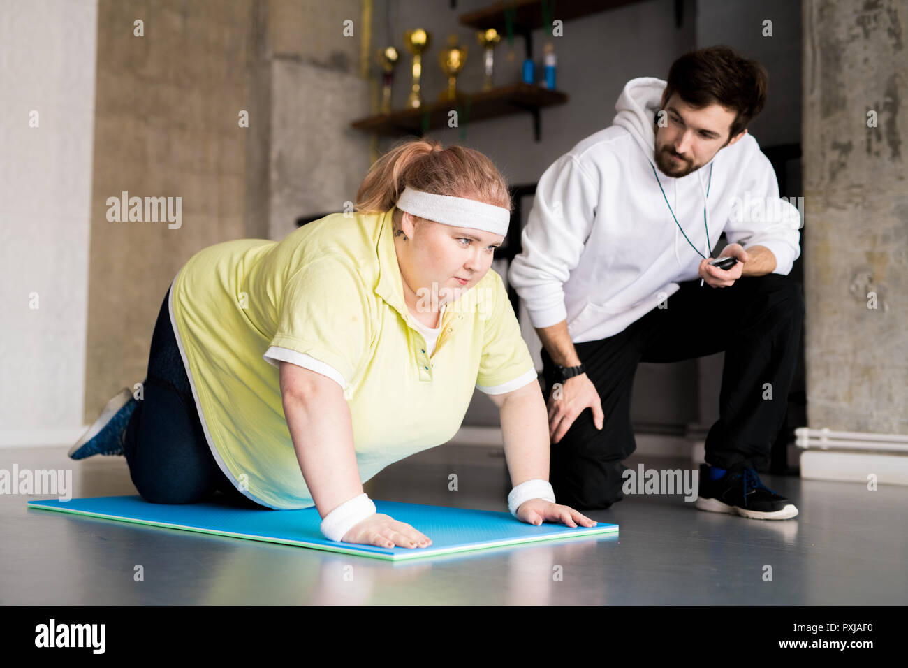 Obese Woman Doing Sports Stock Photo