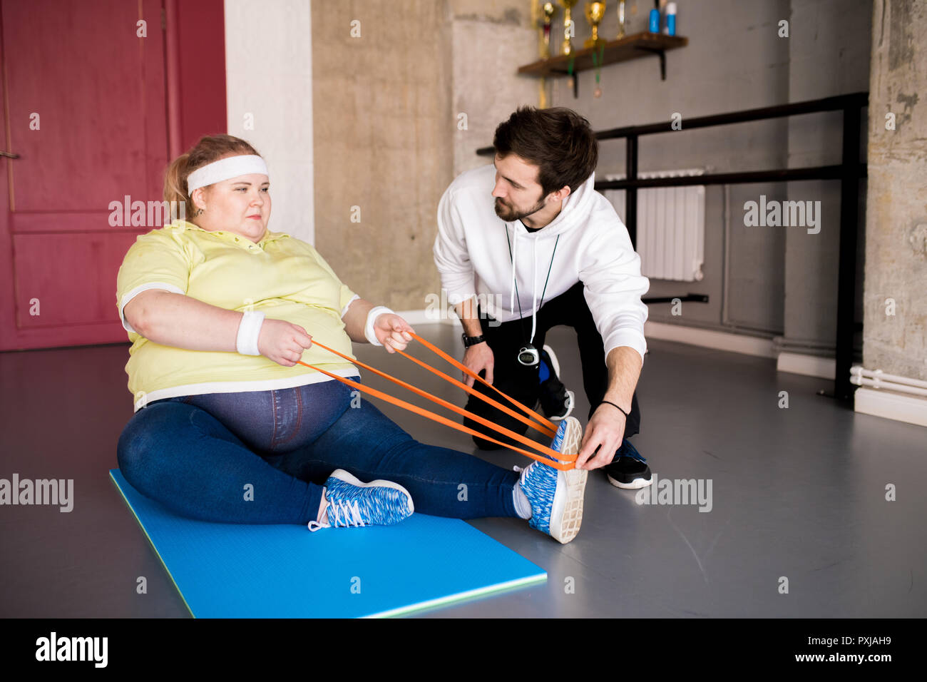 Overweight Woman Doing Sports Stock Photo