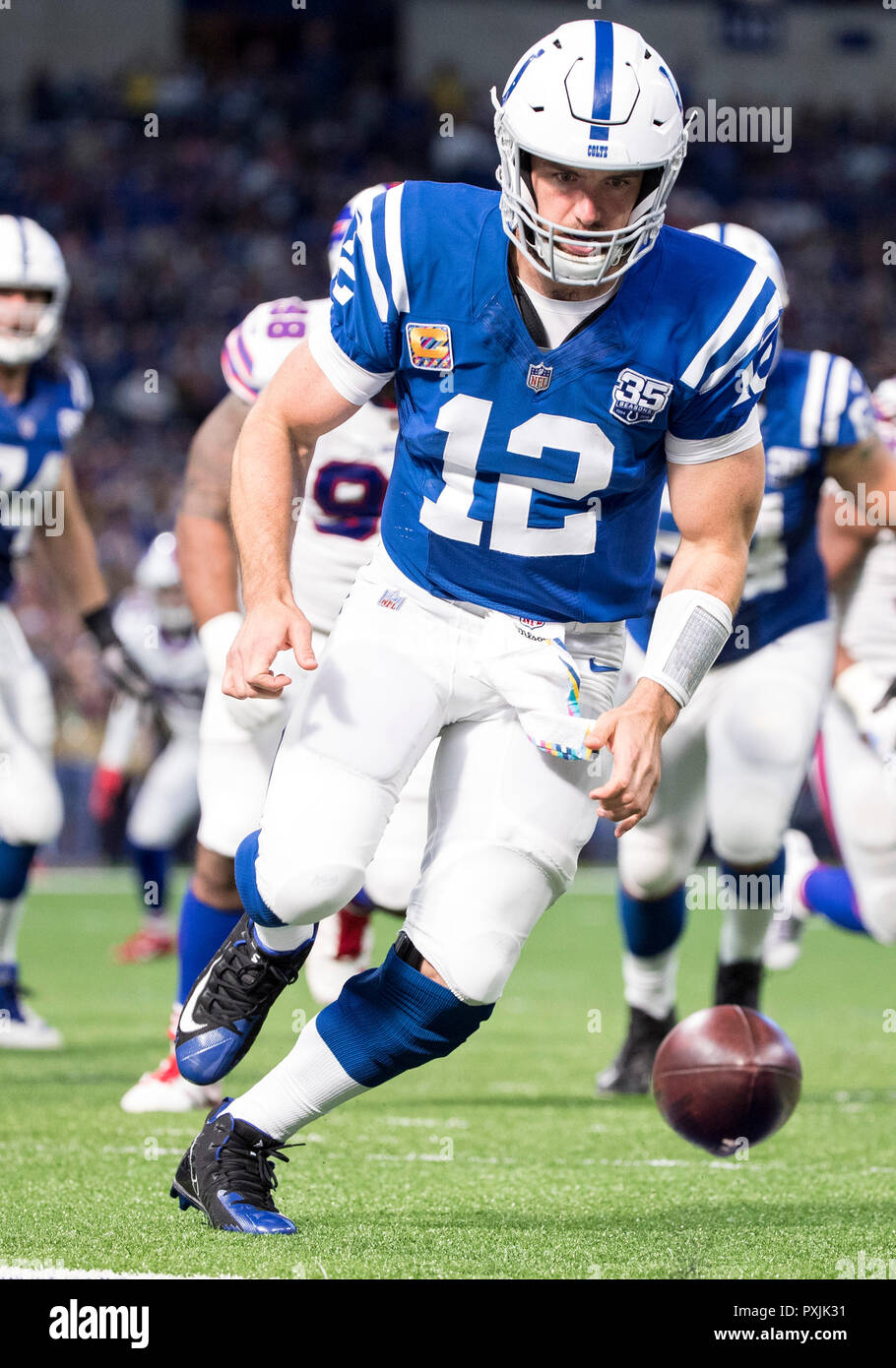 Indianapolis, Indiana, USA. 21st Oct, 2018. Indianapolis Colts quarterback Andrew Luck (12) attempts to recover loose ball during NFL football game action between the Buffalo Bills and the Indianapolis Colts at Lucas Oil Stadium in Indianapolis, Indiana. Indianapolis defeated Buffalo 37-5. John Mersits/CSM/Alamy Live News Stock Photo