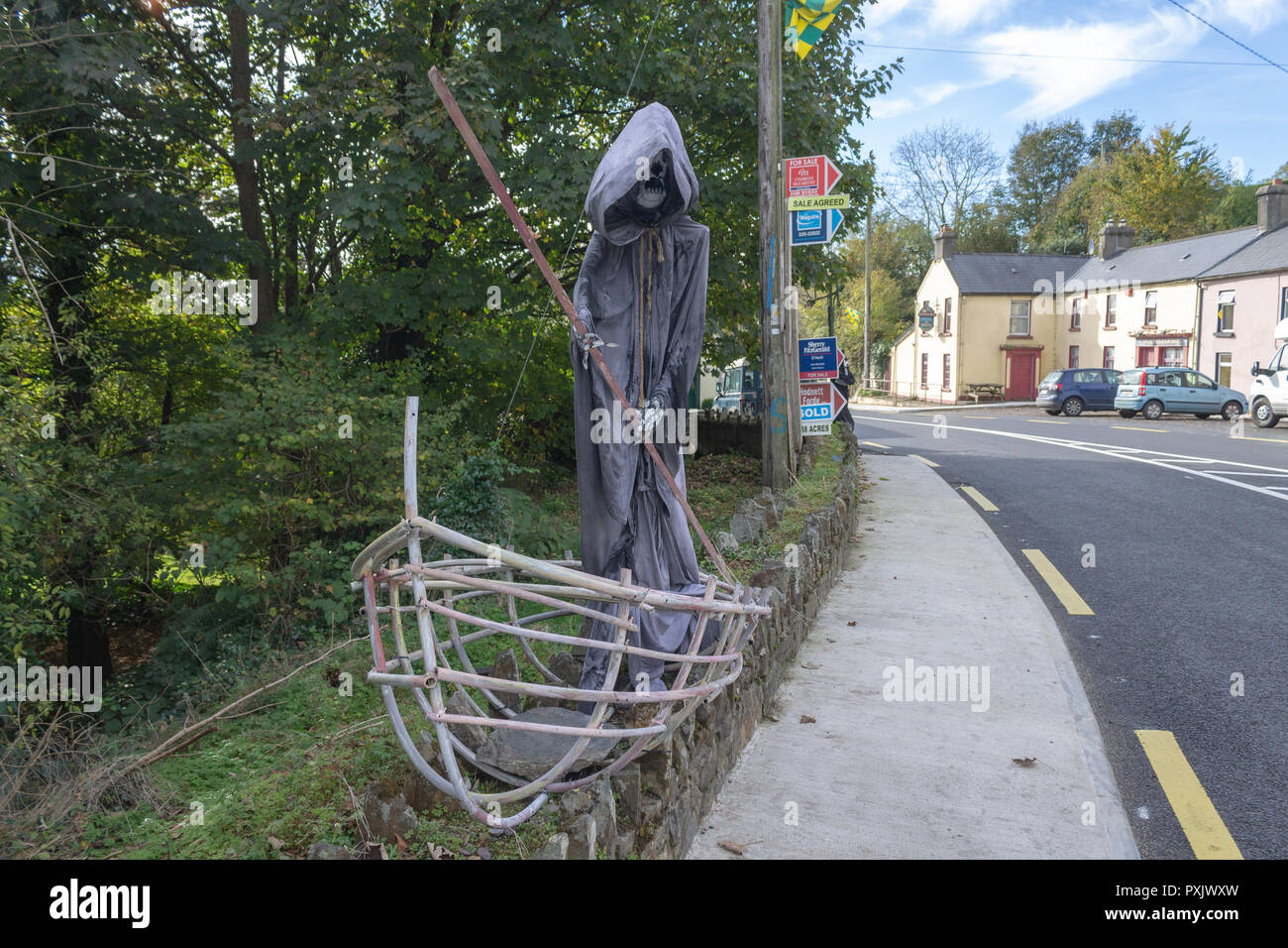 Leap, West Cork, Ireland, October 23rd 2018. Another fine day in West Cork with temperatures reaching 17 Deg. In Leap village scarecrows and ghouls started to appear on the roadside and front gardens as part of the Leap Scarecrow Festival, aiming to make Leap the spookiest place in Ireland. The festival runs from 20th October to 5th November. Credit: aphperspective/Alamy Live News Stock Photo