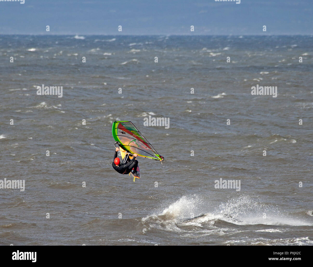 Gullane, East Lothian, Scotland, UK, 23 Oct. 2018 UK weather, 14 degrees with sunshine and winds of 44km/h and gusts of 57 km/h, windsurfers were taking advantage of the windy conditions Stock Photo