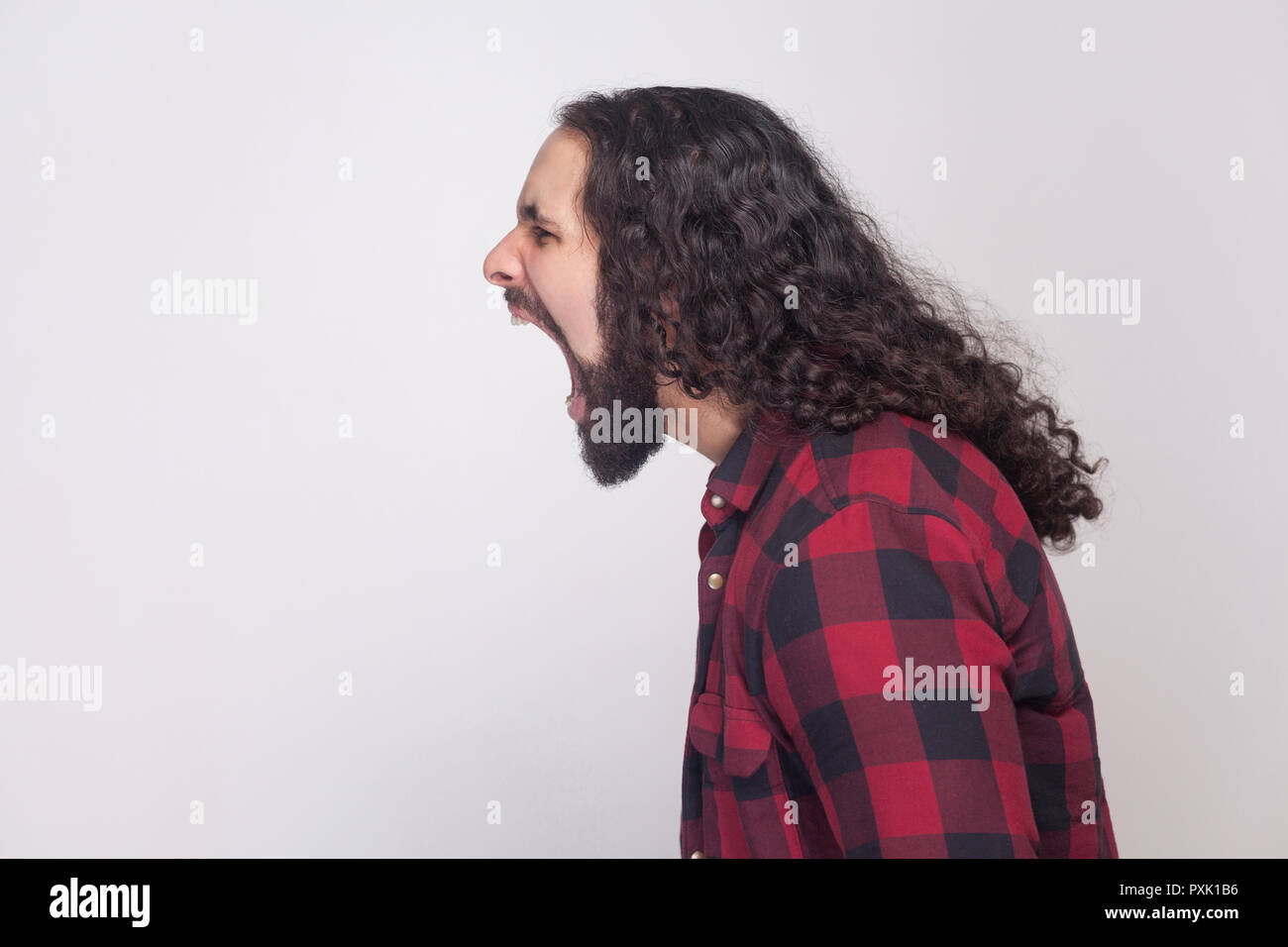 Profile Side View Portrait Of Handsome Angry Man With Beard And