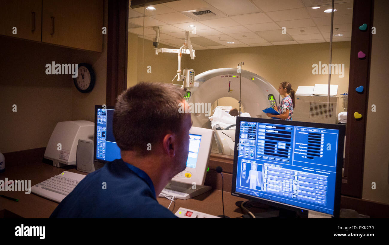 Magnetic Resonance Imaging - MRI -  center at a public hospital. Note: 'patient' is a hospital employee and not an actual patient. Stock Photo