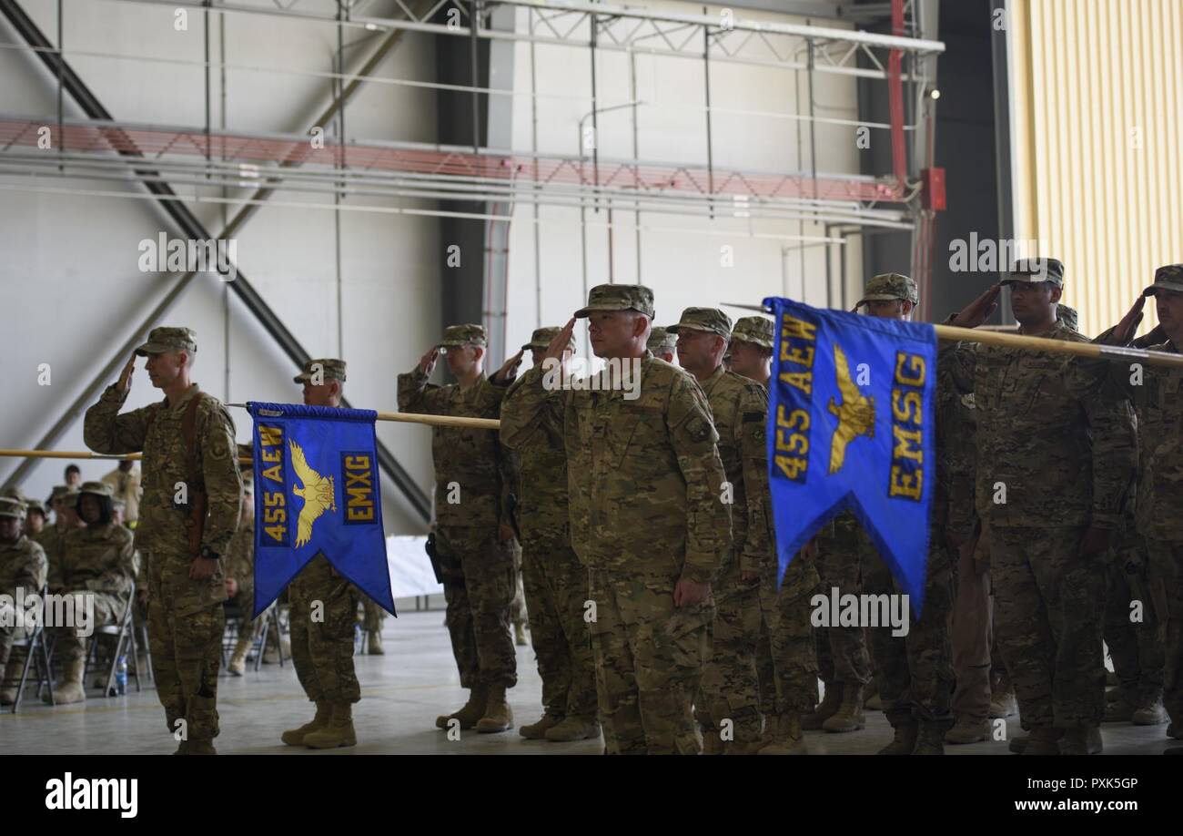 The 455th Air Expeditionary Wing renders the first salute to the new 455th Air Expeditionary Wing commander, Brig. Gen. Craig Baker, during a change of command ceremony at Bagram Airfield, Afghanistan, June 3, 2017. During the ceremony, Brig. Gen. Jim Sears relinquished command of the 455th AEW to Baker. Stock Photo