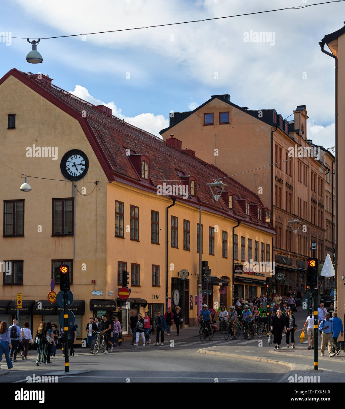 Afternoon view on Götgatan near Medborgarplatsen in Södermalm, Stockholm, with pedestrians mostly walking home from work Stock Photo