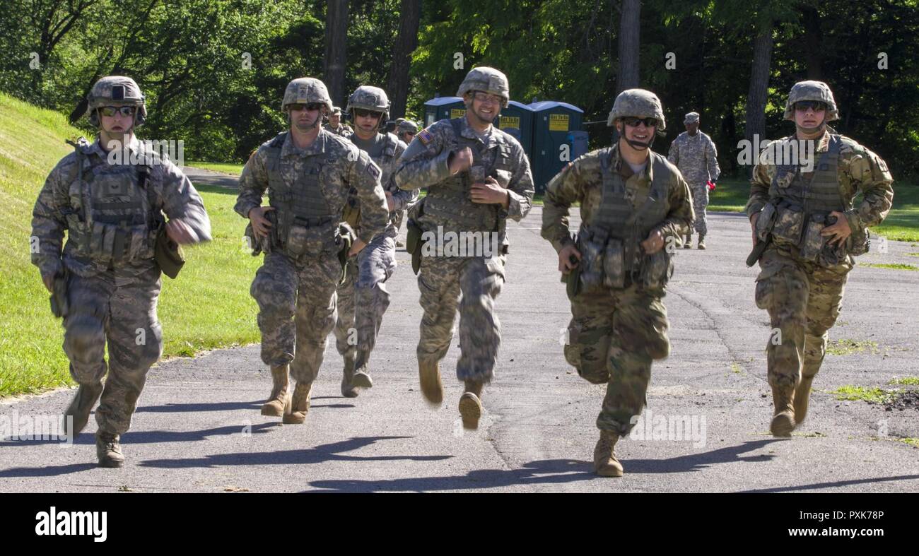 New York Army and Air National Guardsmen run a 100 meter dash for the first  part of the Lt Col. William Donovan Team Pistol Match at the 38th Annual  The Adjutant General's