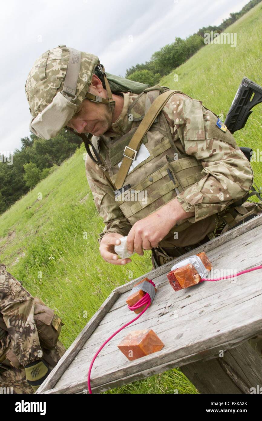 A Ukrainian army engineer with the 1st Airmobile Battalion, 79th Air ...