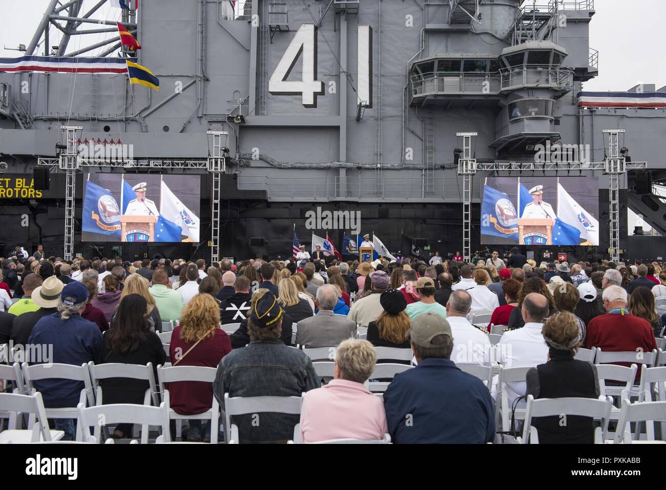 SAN DIEGO (June 5, 2017) Chief of Naval Operations Adm. John Richardson addresses guests during the 75th Anniversary Battle of Midway commemoration aboard the USS Midway Museum. The 75th anniversary commemorated all of the sacrifices during the Battle of Midway. Stock Photo