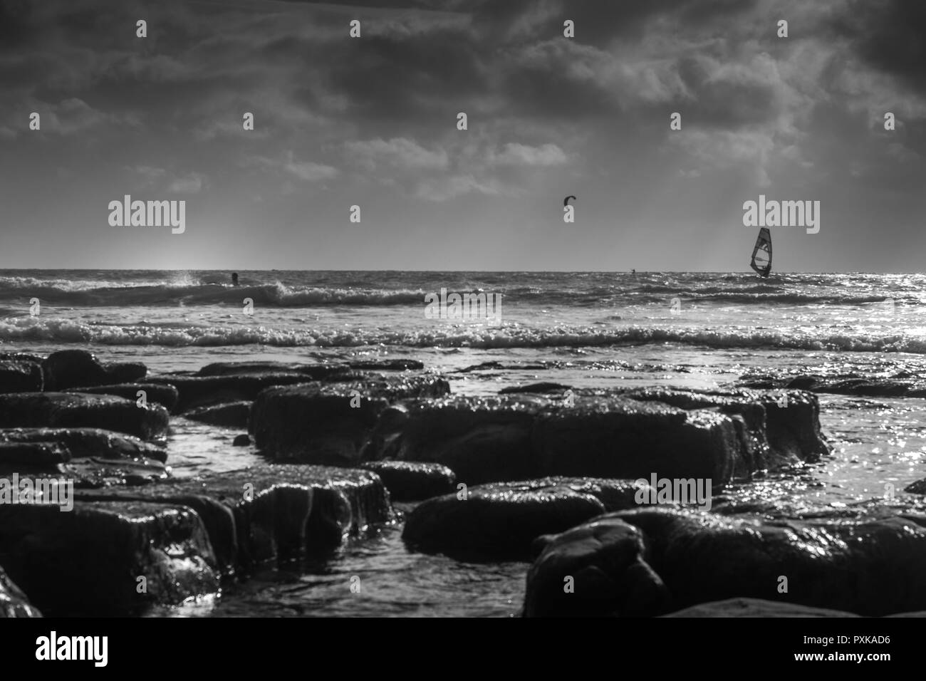 Rocky beach on pacific Black and White Stock Photos & Images - Alamy