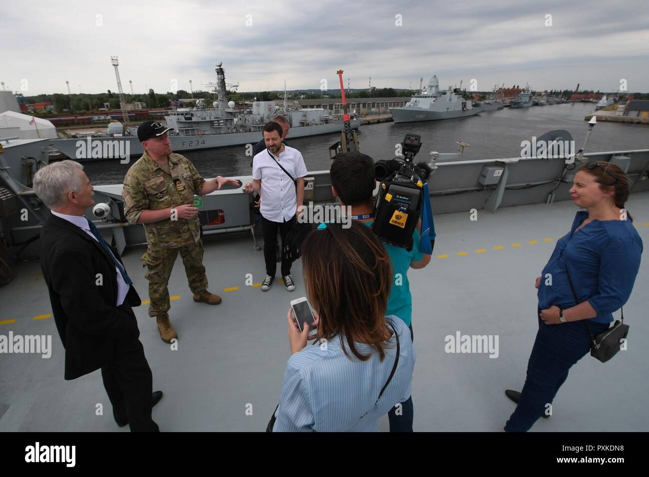 - SZCZECIN, Poland (June 3, 2017) Danish navy Cmdr. Anders Jessing, executive officer of the Danish Absalon-class combat support ship HDMS Absalon (L16), gives Polish media a tour of the ship during the pre-sail portion of exercise BALTOPS 2017, June 3, 2017. BALTOPS is an annual U.S.-led, Naval Striking and Support Forces NATO-executed, multinational maritime exercise in the Baltic Sea region designed to enhance flexibility and interoperability among its participants. Stock Photo